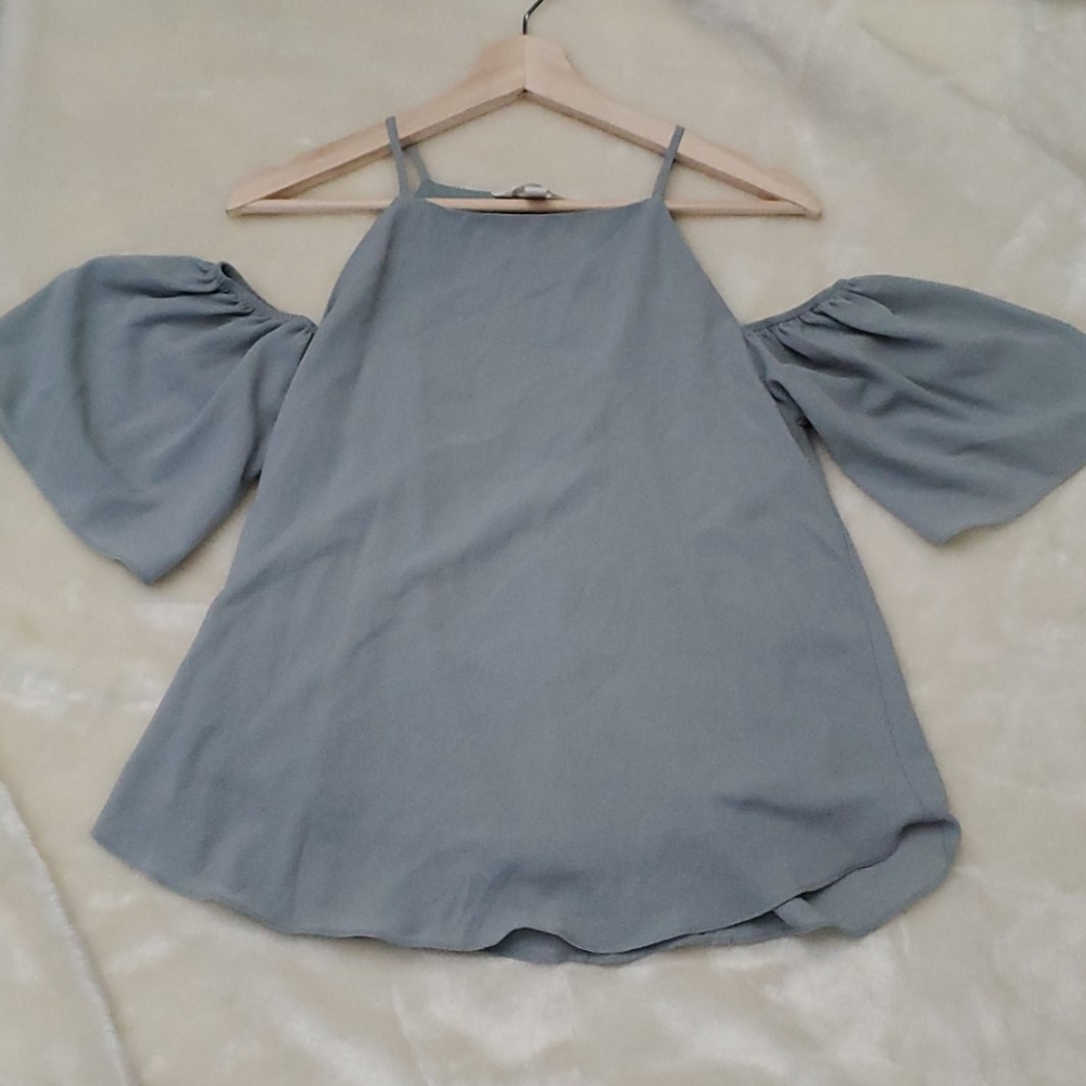 Light teal blouse with straps